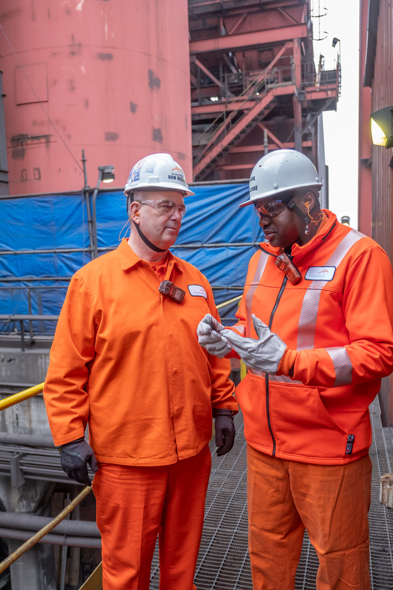 ArcelorMittal Dofasco President and CEO, Ron Bedard speaking with an employee