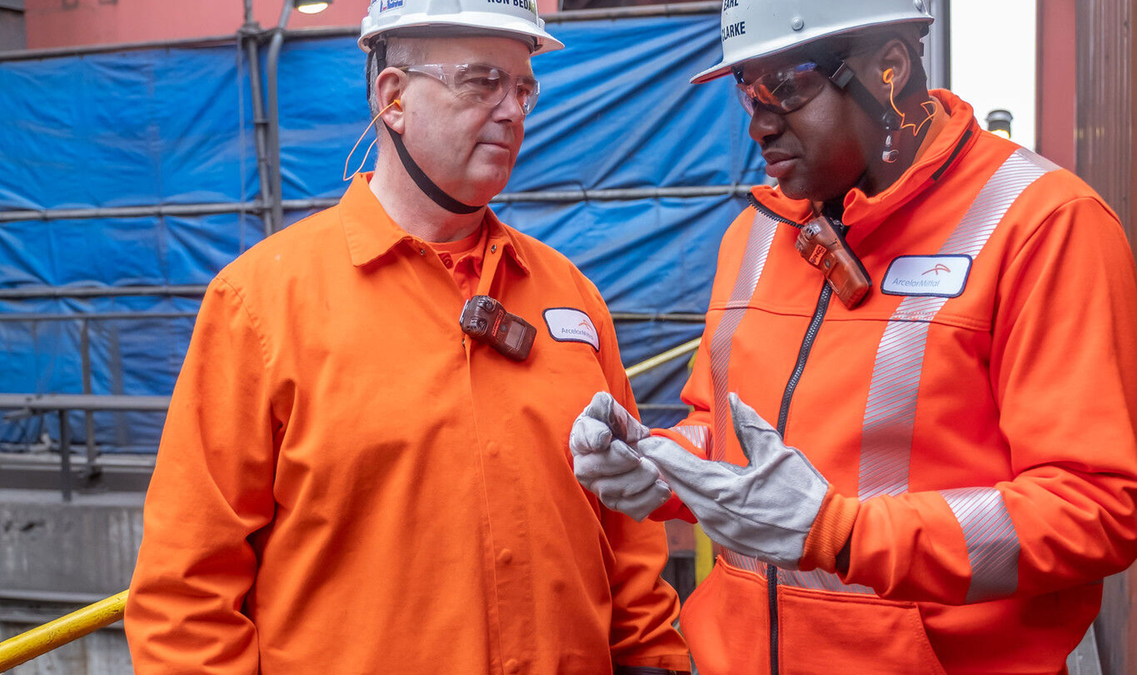 ArcelorMittal Dofasco President and CEO, Ron Bedard speaking with an employee