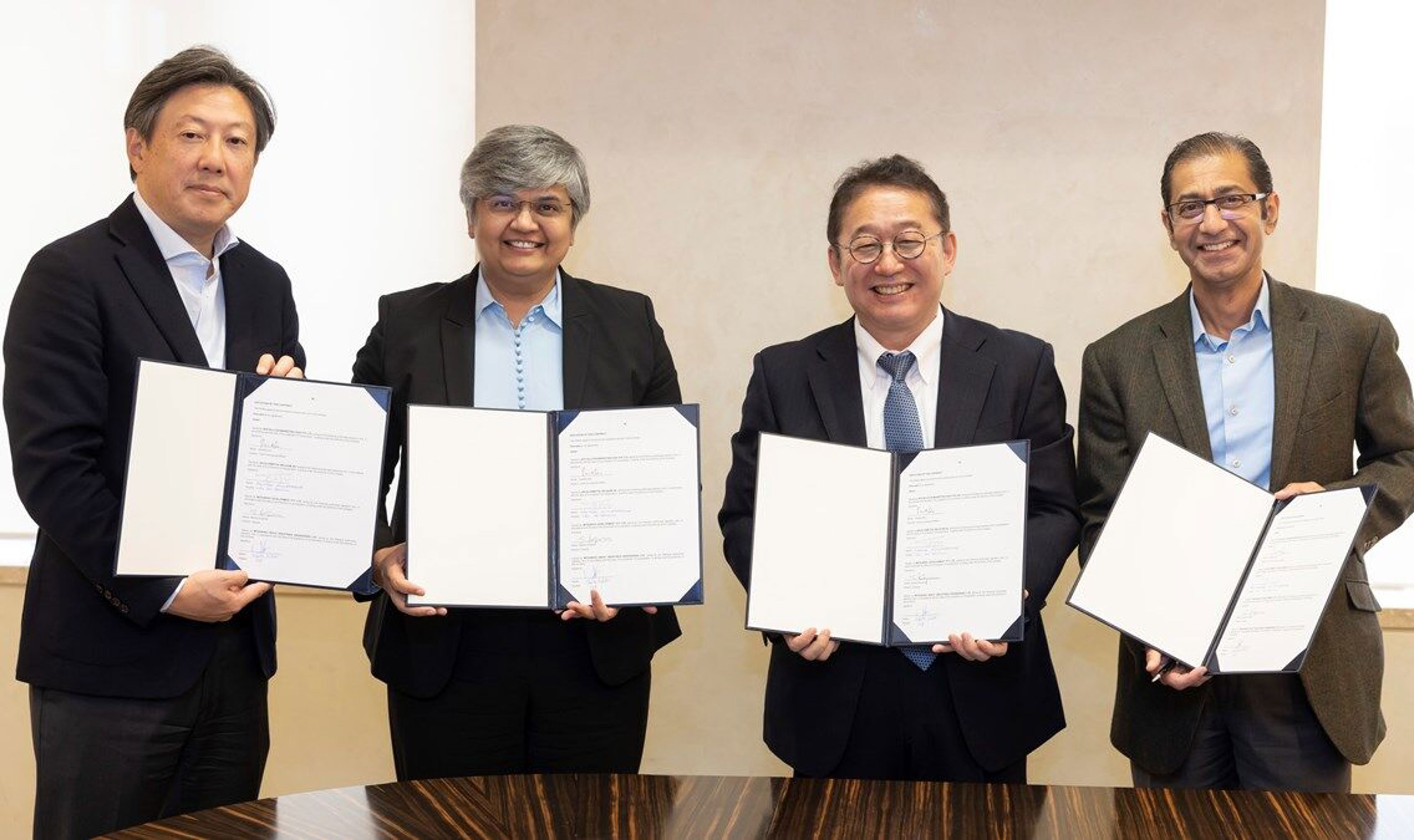 photo-signing-news-release.jpg