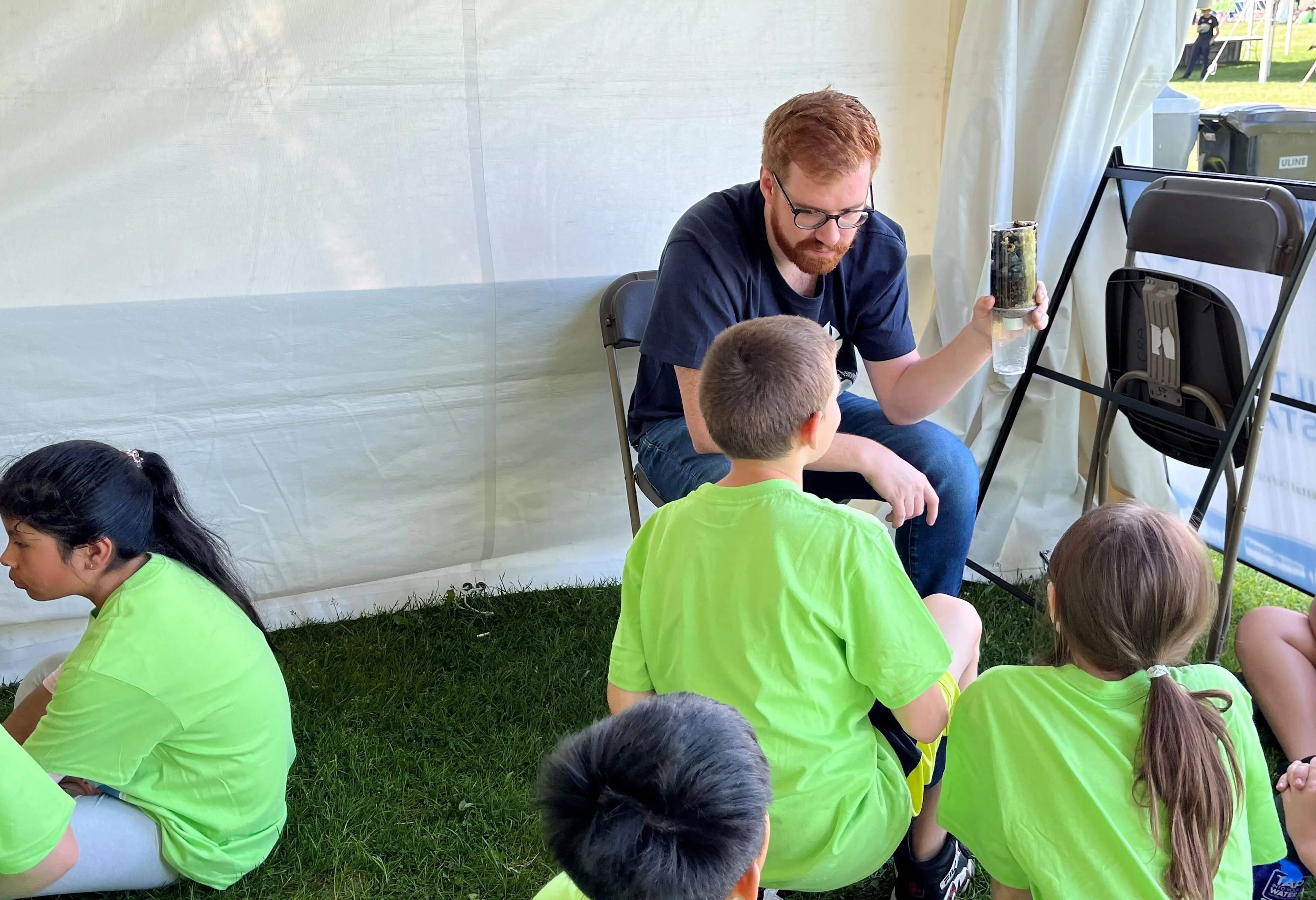 students learning from employees at children's water festival!