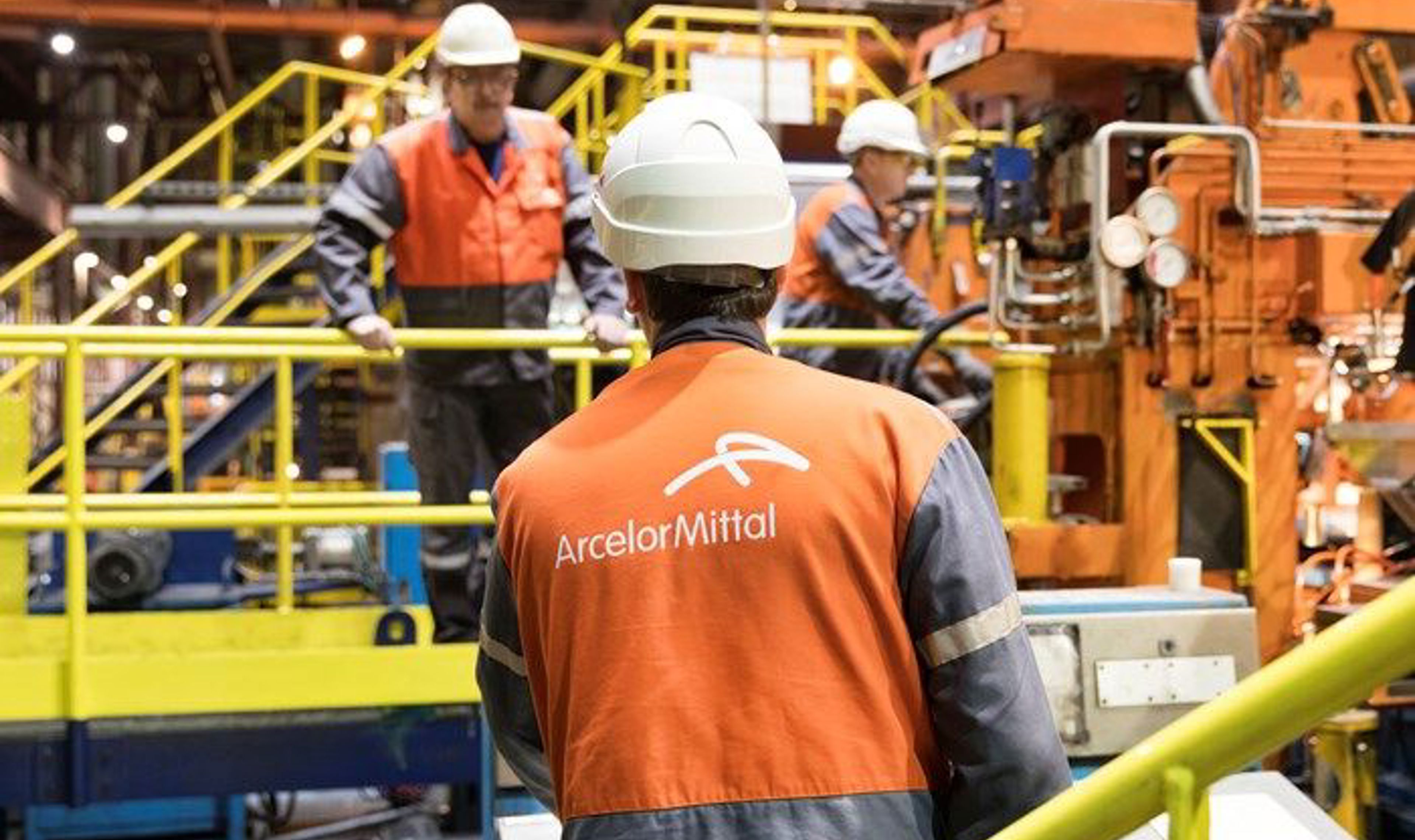 Workers chatting in hard hats.jpg