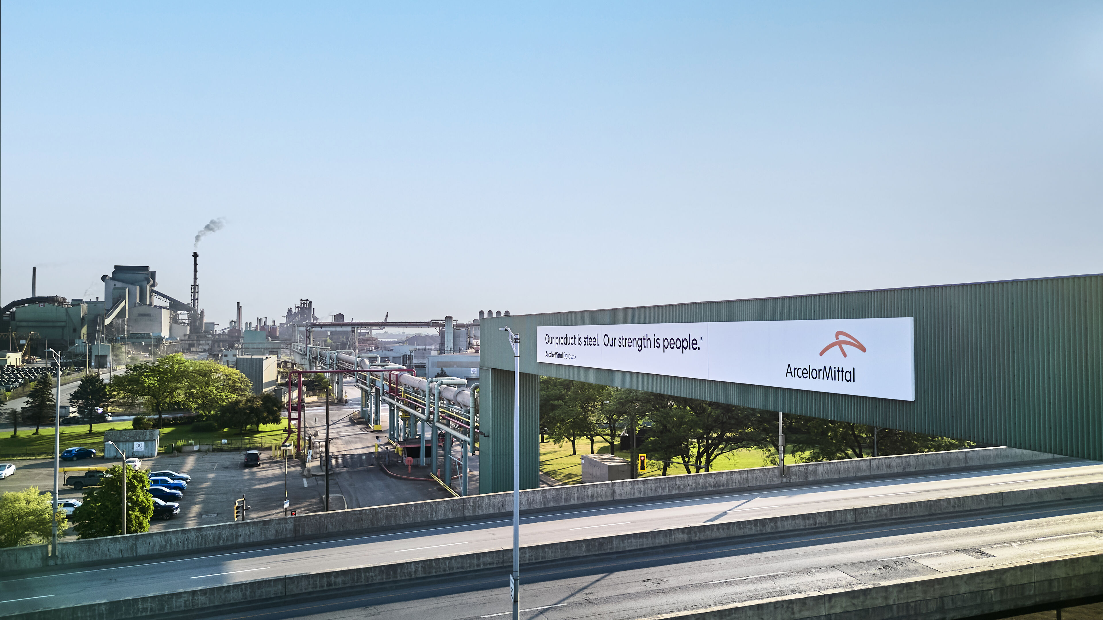 Pipe bridge sign: Our product is steel. Our strength is people. 