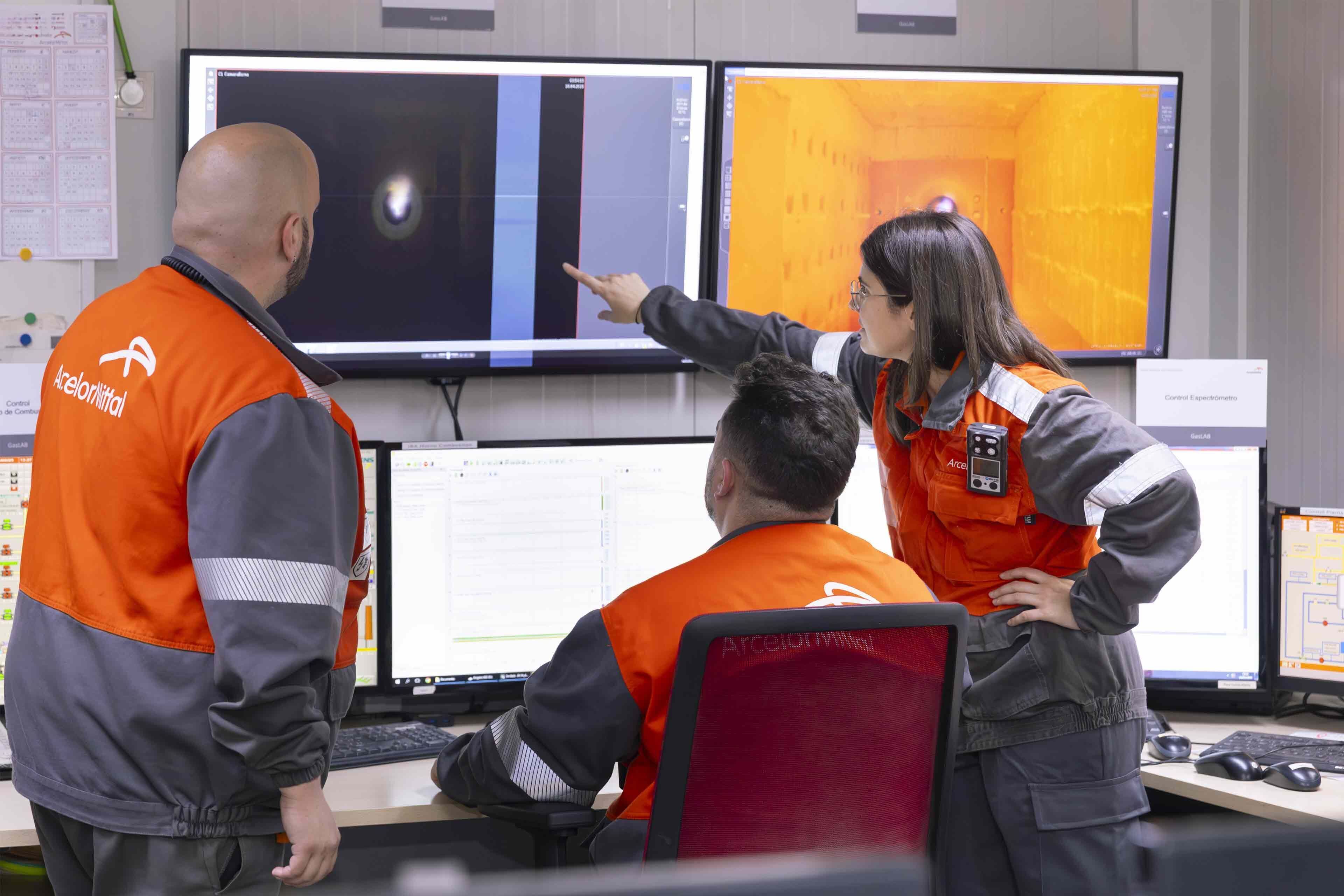 ArcelorMittal Gijon R&D colleagues in a control room viewing at experimental furnace .jpg
