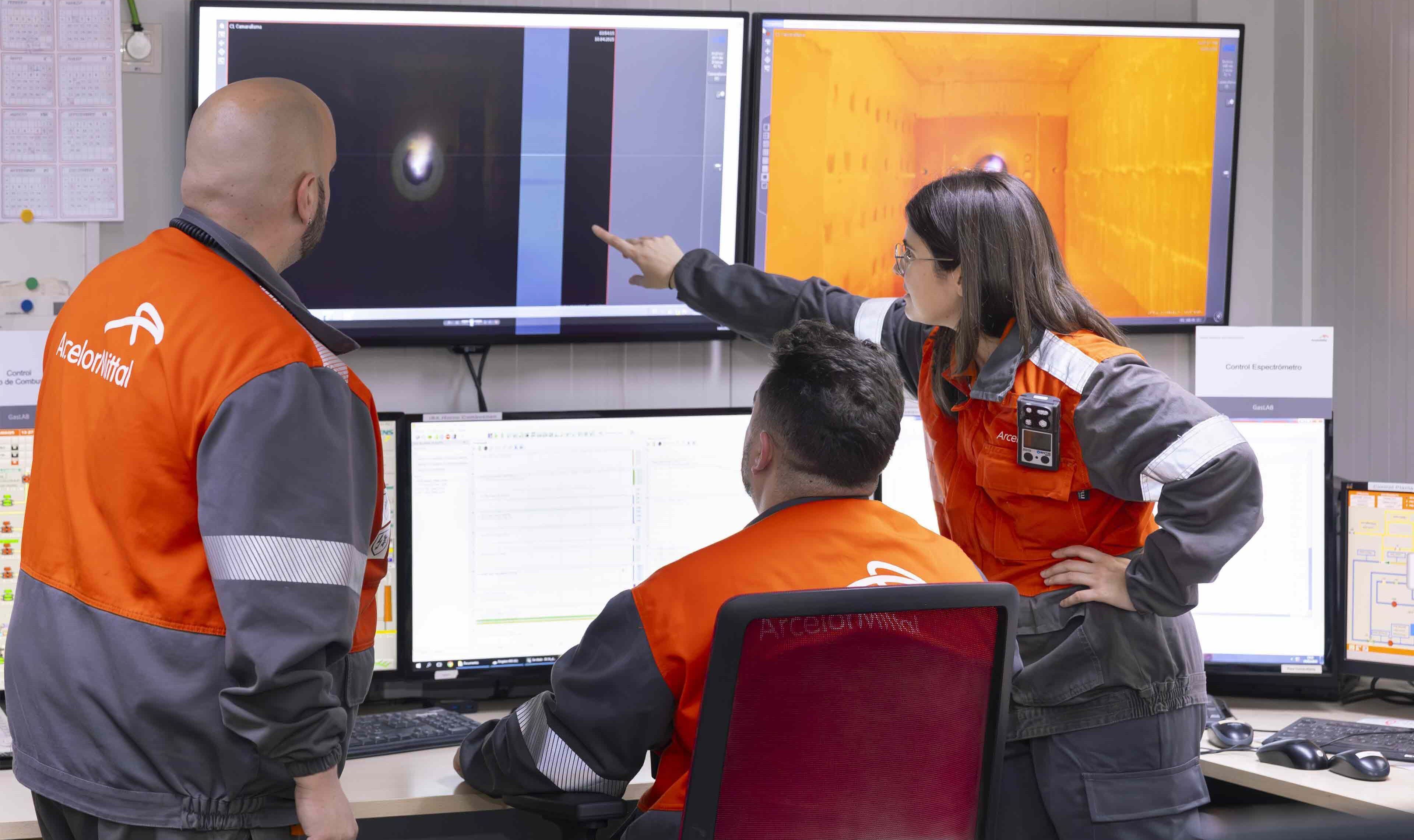 ArcelorMittal Gijon R&D colleagues in a control room viewing at experimental furnace .jpg