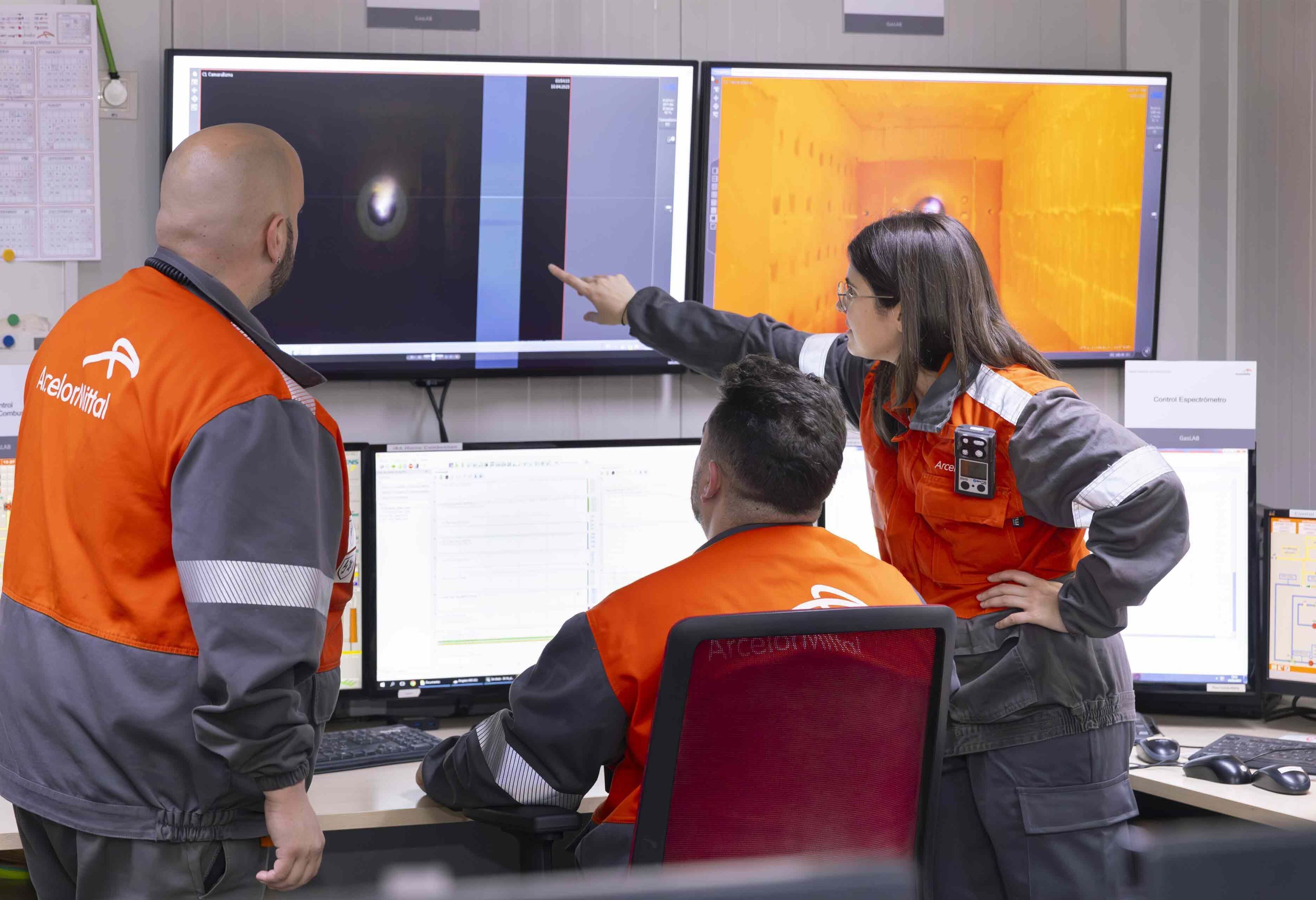 ArcelorMittal Gijon R&D colleagues in a control room viewing at experimental furnace .jpg