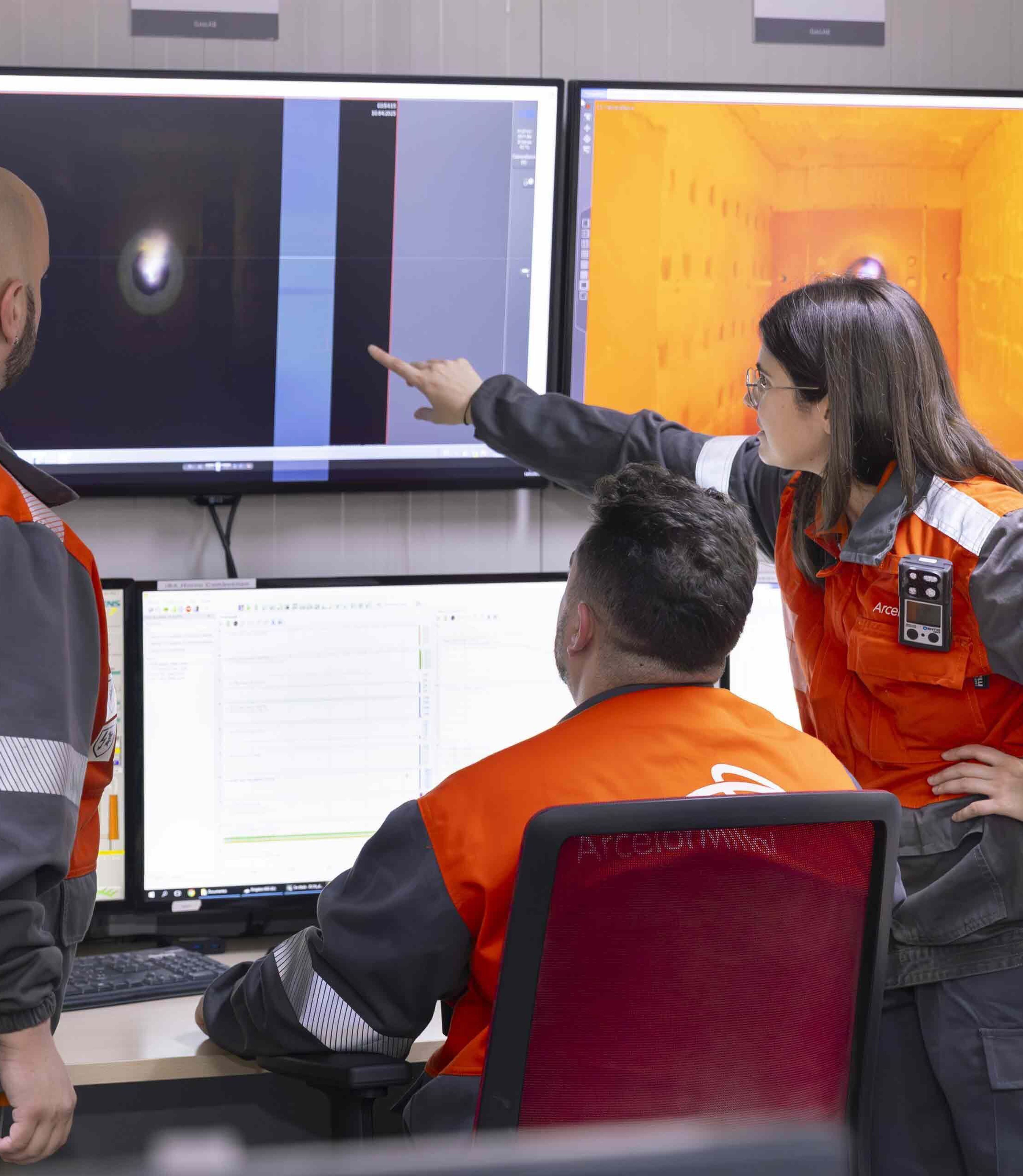 ArcelorMittal Gijon R&D colleagues in a control room viewing at experimental furnace .jpg