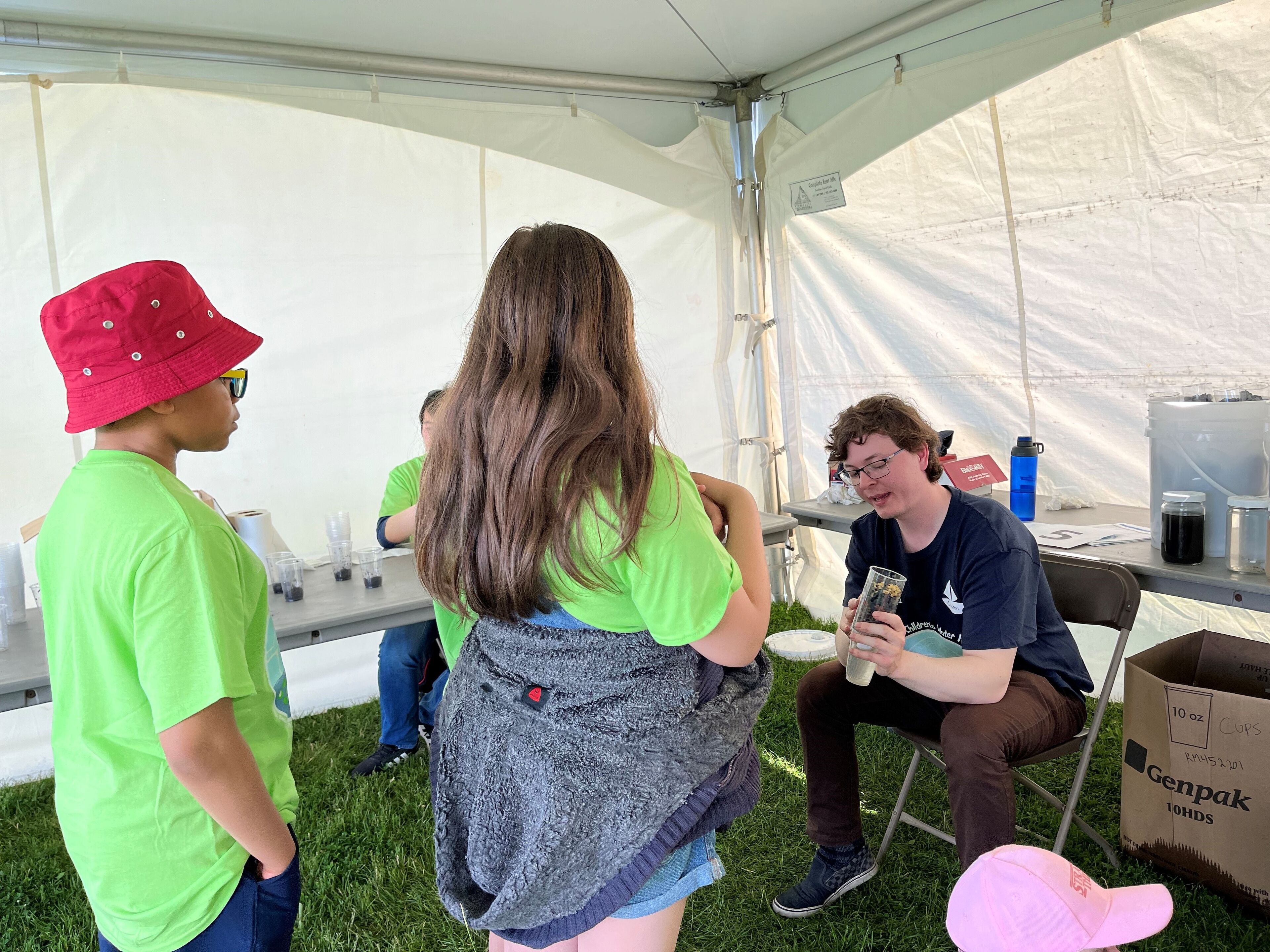 students with employee at children's water festival (1)
