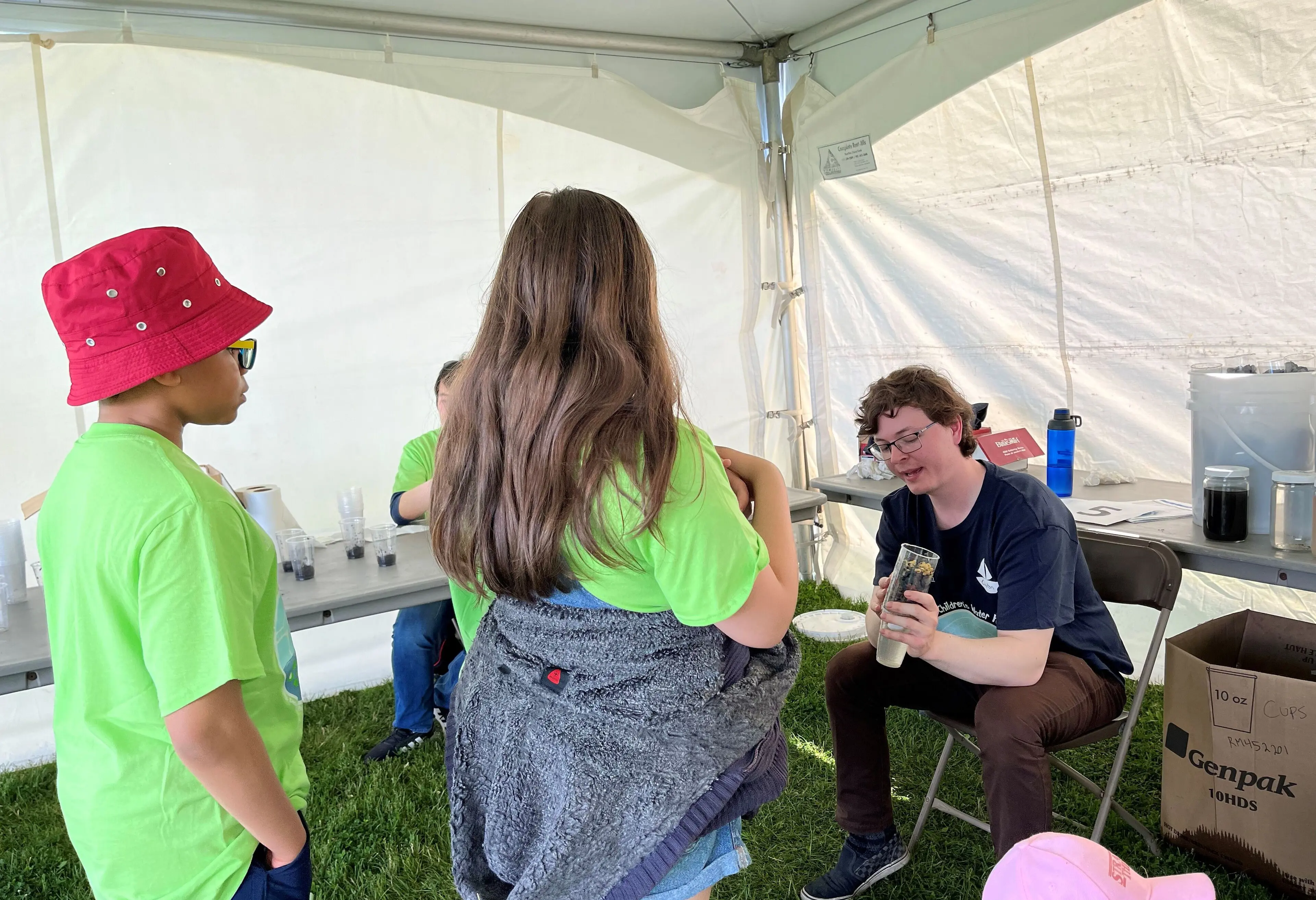 students with employee at children's water festival (1)